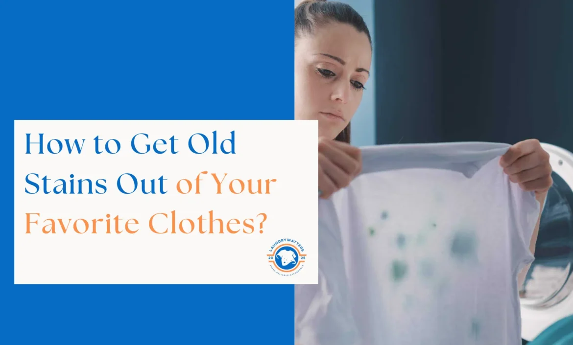 Woman examining a stained shirt in front of a washing machine, with text asking 'How to Get Old Stains Out of Your Favorite Clothes?